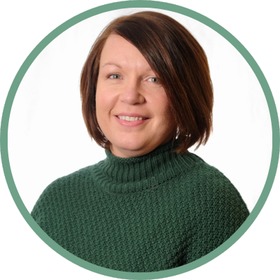 Jennifer Reeves in a green turtleneck sweater.